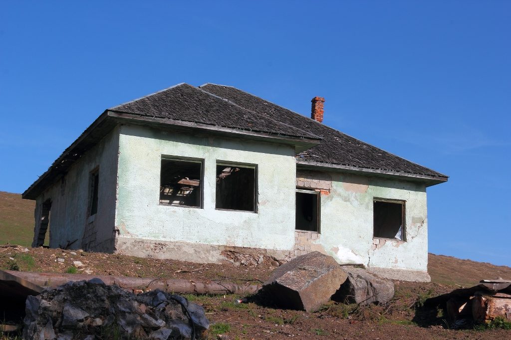 damaged abandoned home