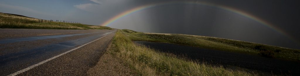 rainbow in dark sky